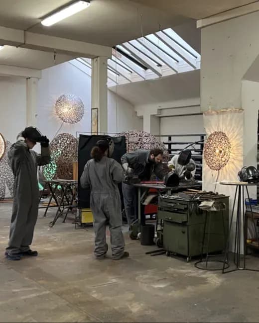 Kreatives Teamevent mit Metallskulpturen in der Schweiz